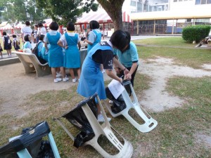 Members were setting up the temporary rubbish bins.