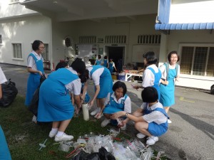 Members help to clear up after the events ends.