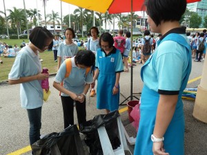 Our members are ensuring that the students categorized the rubbish correctly,